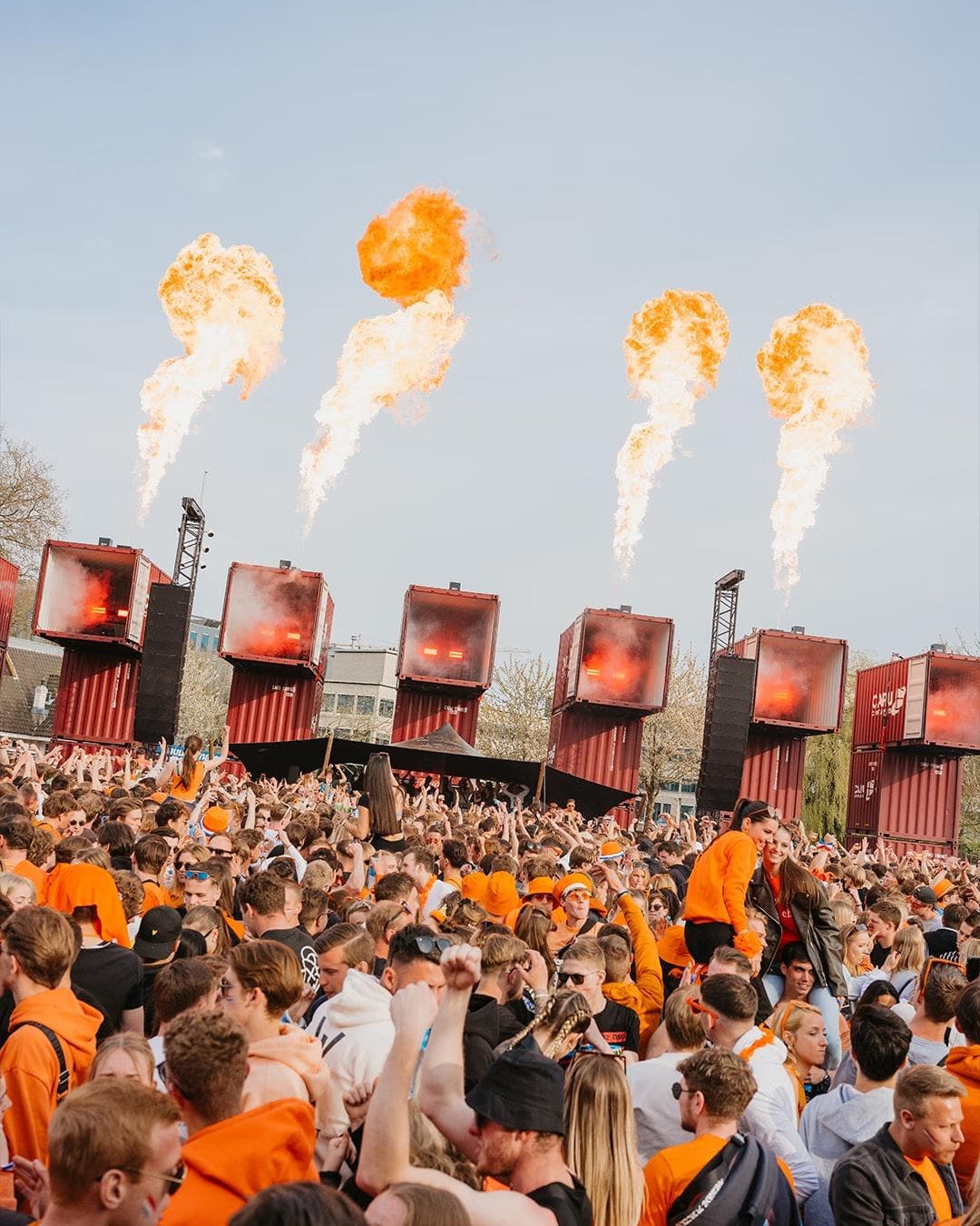 Oranjebloesem Kingsday festival in Amsterdam with crowd dancing outdoor techno event April 2026
